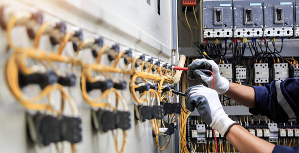 Professional Electrician technician working in Hand County County, SD